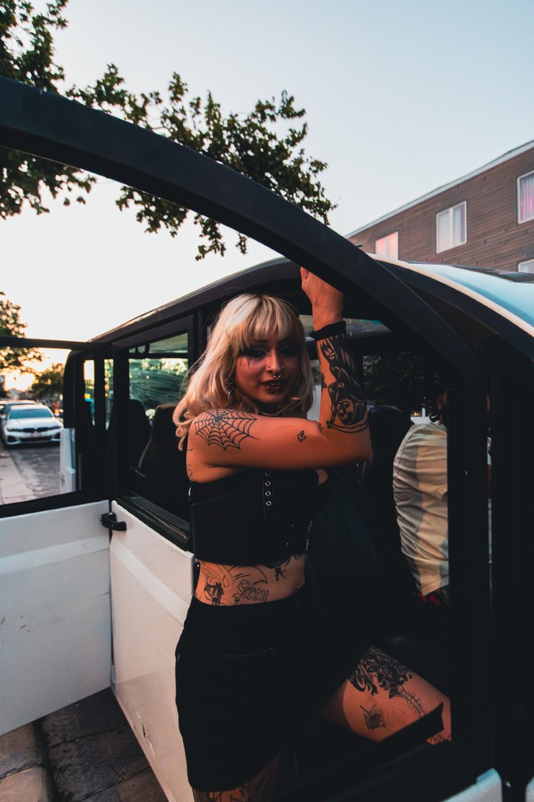 Happy passengers entering Tripz vehicle